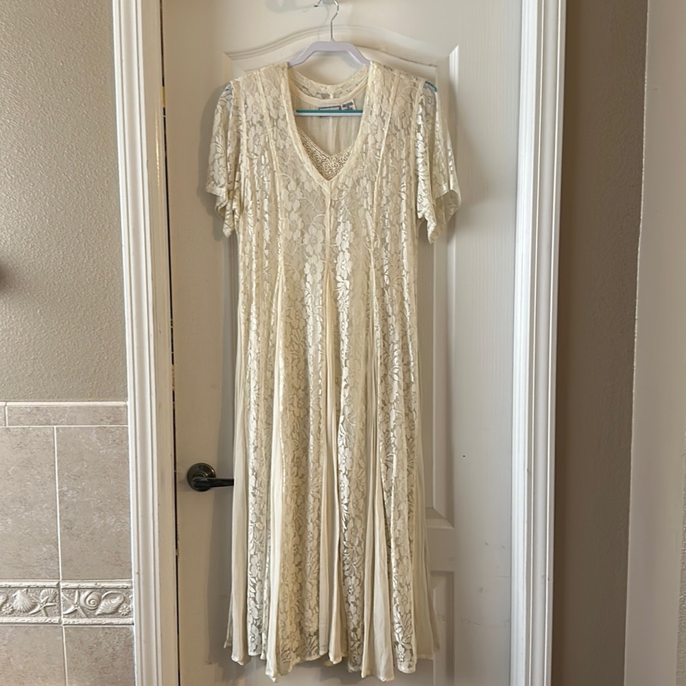Vintage 1980’s full length dress.  Cream color, lace overlay.  Size L fits M
